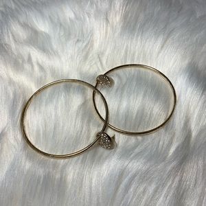 Gold hoops with earrings